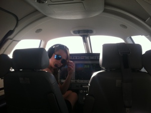Sitting pretty in the cockpit of the jet.